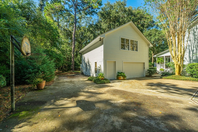 view of home's exterior with a garage