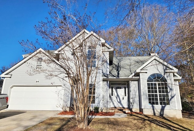 front of property with a garage