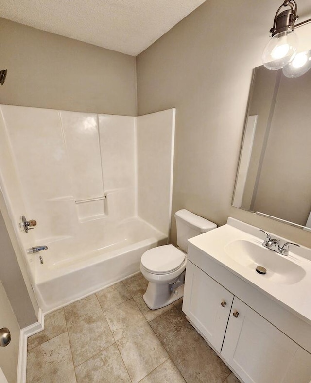 full bathroom with vanity, a textured ceiling, toilet, and  shower combination