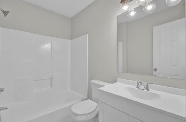 full bathroom with vanity, tub / shower combination, and toilet