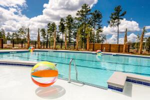 community pool with fence
