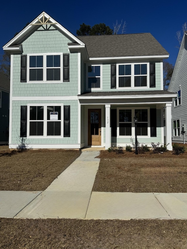 view of front of house featuring covered porch