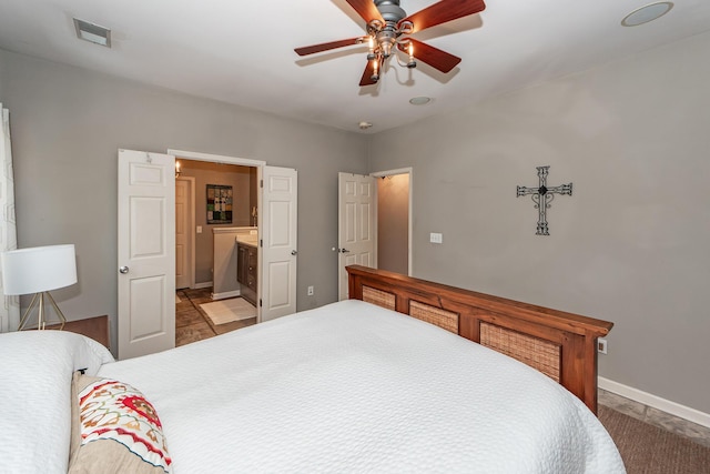 bedroom featuring visible vents, a ceiling fan, and baseboards