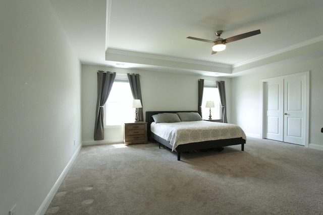 103 Granton Edge Ln, Summerville, SC 29486 - carpeted bedroom with a raised ceiling, crown molding, multiple windows, and a ceiling fan