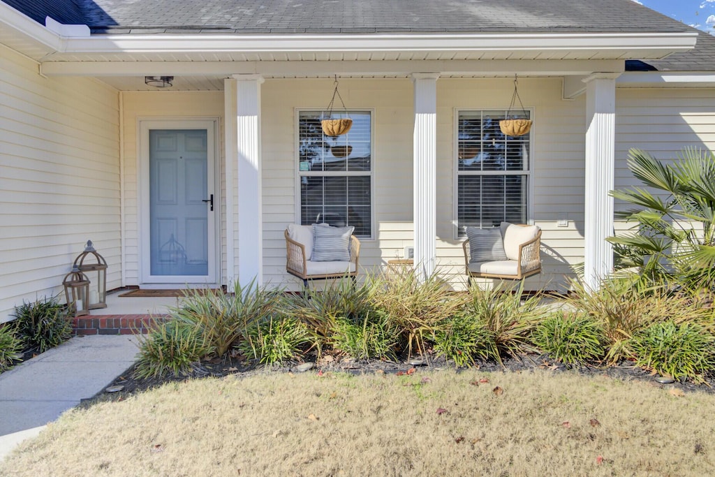 property entrance with a porch