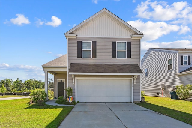 view of front facade featuring board and batten siding, an attached garage, a front yard, and concrete driveway