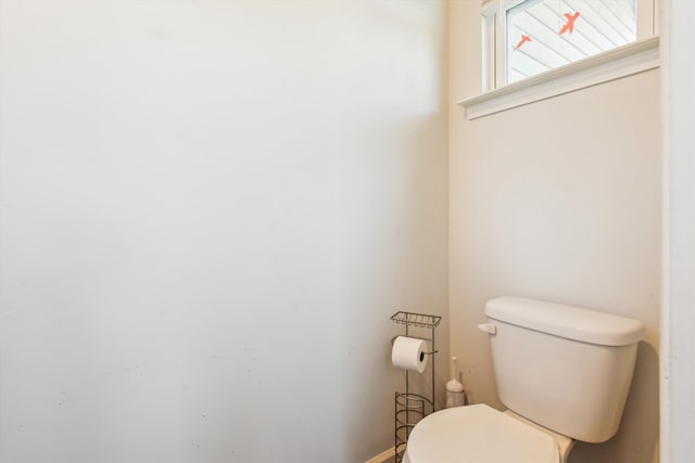 bathroom featuring toilet