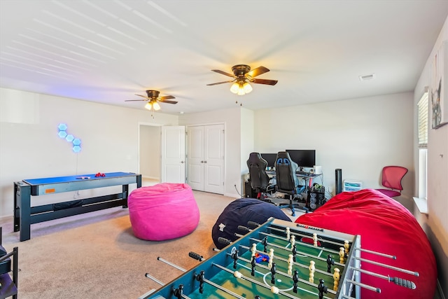 game room with ceiling fan and visible vents