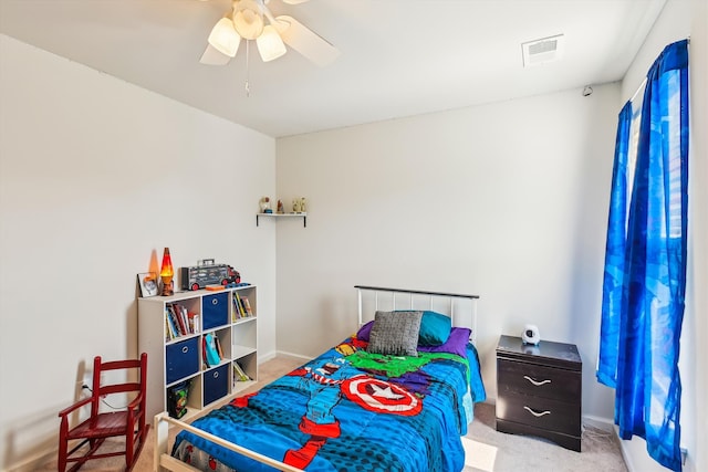 bedroom with ceiling fan, baseboards, carpet flooring, and visible vents