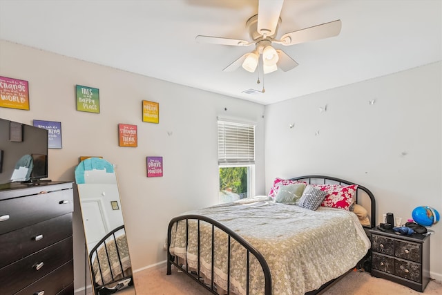 bedroom featuring ceiling fan, baseboards, visible vents, and carpet