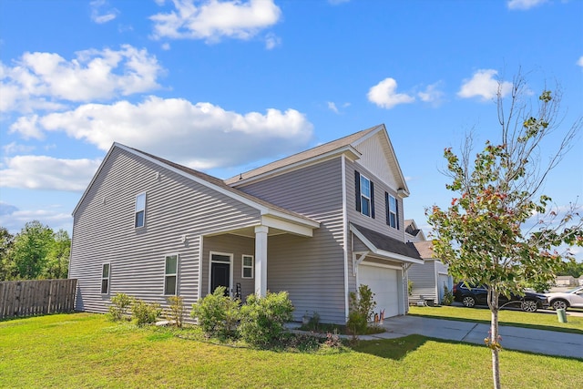 view of home's exterior featuring fence, a lawn, driveway, and an attached garage