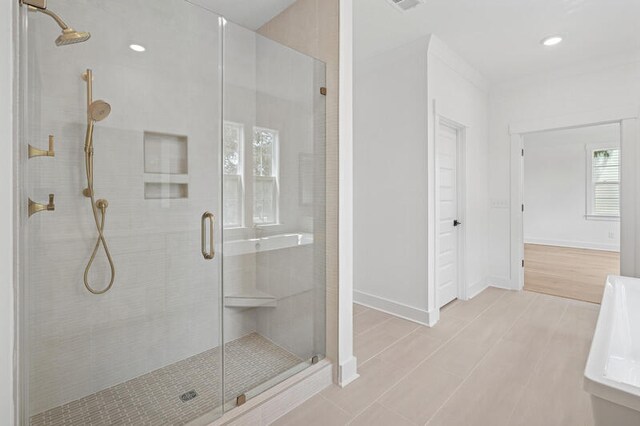 2006 Riverbend Dr, Charleston, SC 29412 - full bath featuring a stall shower, baseboards, and recessed lighting