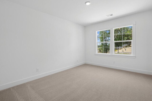 2006 Riverbend Dr, Charleston, SC 29412 - unfurnished room featuring light colored carpet and baseboards