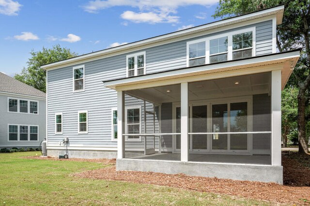2006 Riverbend Dr, Charleston, SC 29412 - back of property with a sunroom and a yard