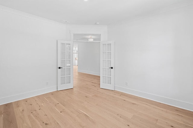 2006 Riverbend Dr, Charleston, SC 29412 - empty room featuring french doors, light wood-style flooring, baseboards, and ornamental molding