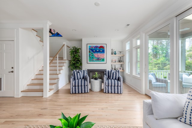 1532 Sea Palms Cres, Mount Pleasant, SC 29464 - living area with stairs, light wood-style flooring, ceiling fan, a fireplace, and recessed lighting
