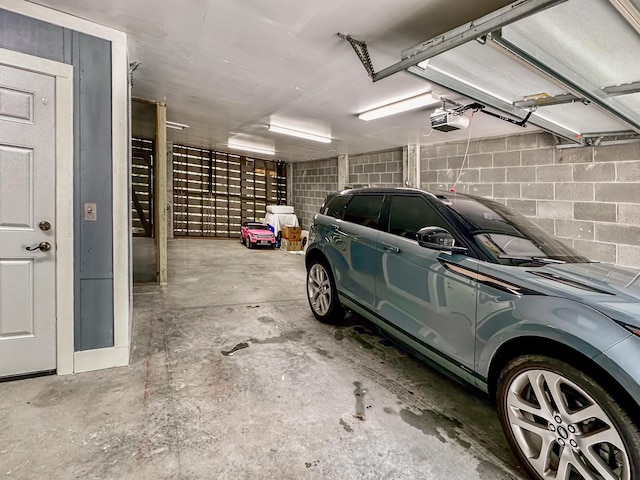 1532 Sea Palms Cres, Mount Pleasant, SC 29464 - garage featuring a garage door opener and concrete block wall