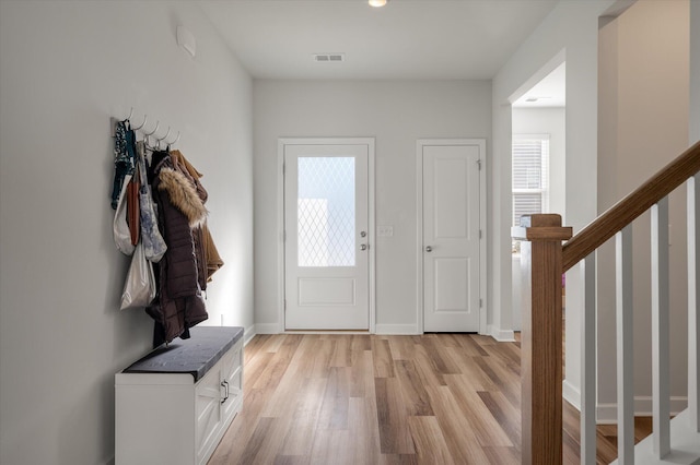 foyer with light hardwood / wood-style floors