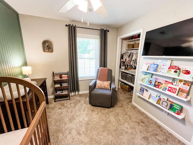 bedroom with carpet, ceiling fan, and baseboards