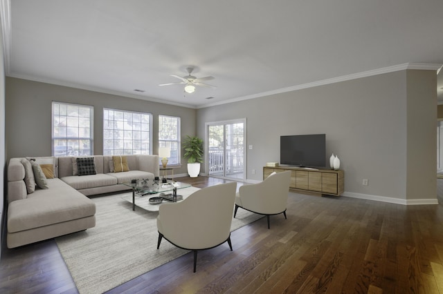 living room with a healthy amount of sunlight and dark hardwood / wood-style floors