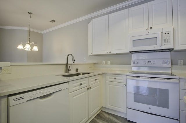 kitchen featuring crown molding, sink, white cabinets, and white appliances