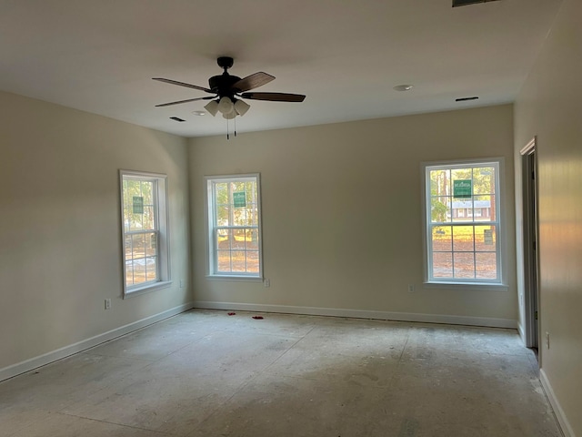 unfurnished room with ceiling fan