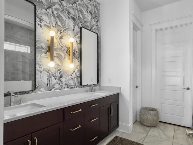 bathroom featuring double vanity and a sink