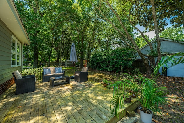 wooden deck featuring an outdoor hangout area