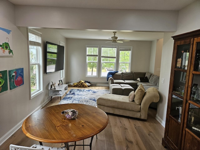 1495 Keshi Pearl Dr, Mount Pleasant, SC 29466 - living area featuring wood finished floors, baseboards, and ceiling fan