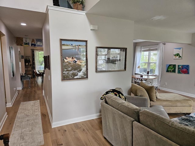 1495 Keshi Pearl Dr, Mount Pleasant, SC 29466 - living area with wood finished floors, baseboards, plenty of natural light, and recessed lighting