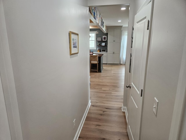 1495 Keshi Pearl Dr, Mount Pleasant, SC 29466 - hall with light wood-style flooring, baseboards, and recessed lighting
