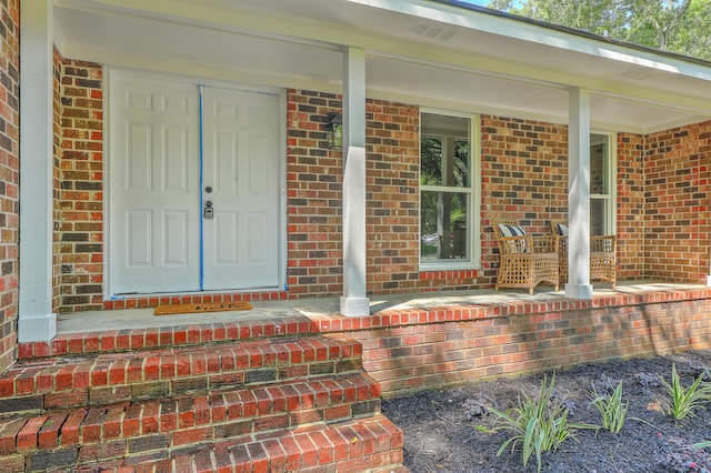 169 Southwold Cir, Goose Creek, SC 29445 - entrance to property featuring covered porch and brick siding