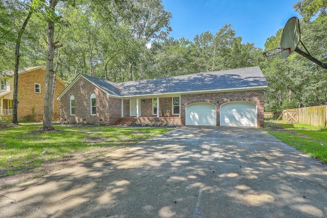 169 Southwold Cir, Goose Creek, SC 29445 - view of front of house featuring fence, a garage, driveway, and brick siding