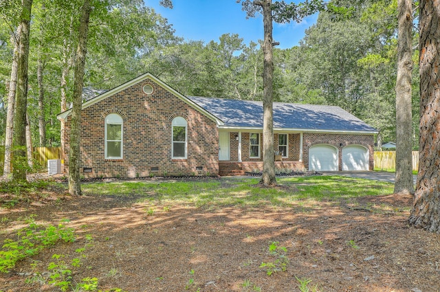 169 Southwold Cir, Goose Creek, SC 29445 - single story home with crawl space, an attached garage, fence, brick siding, and asphalt driveway