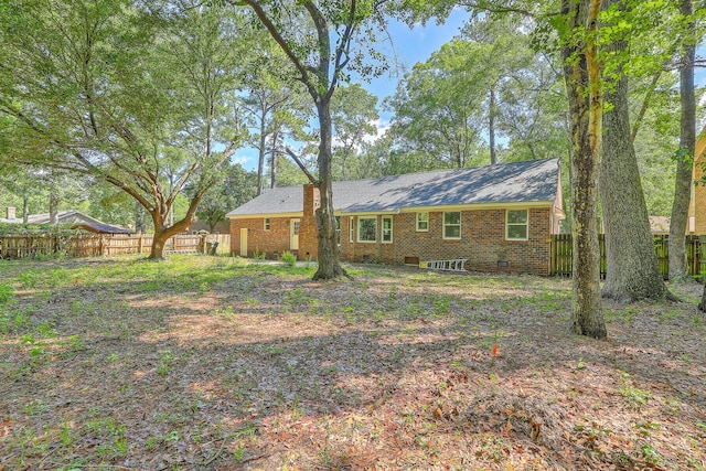 169 Southwold Cir, Goose Creek, SC 29445 - back of house featuring a fenced backyard and brick siding