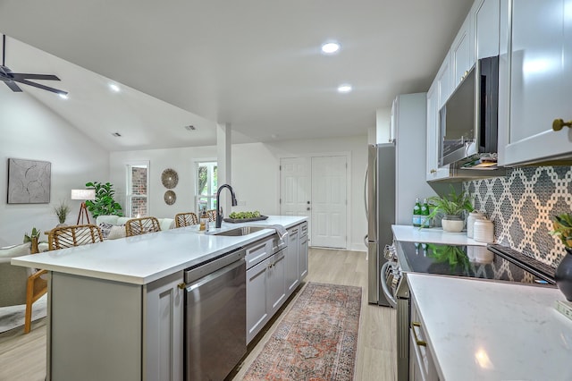 169 Southwold Cir, Goose Creek, SC 29445 - kitchen with stainless steel appliances, a sink, gray cabinets, light wood-style floors, and light countertops