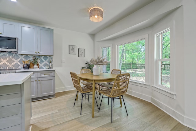 169 Southwold Cir, Goose Creek, SC 29445 - dining space with baseboards and light wood-style floors
