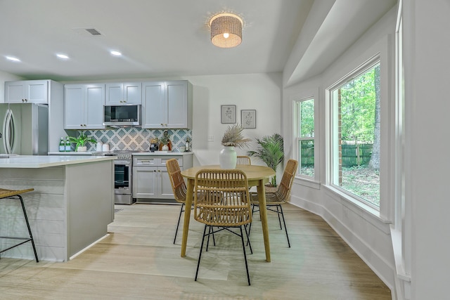 169 Southwold Cir, Goose Creek, SC 29445 - dining space with light wood-style floors, recessed lighting, and baseboards