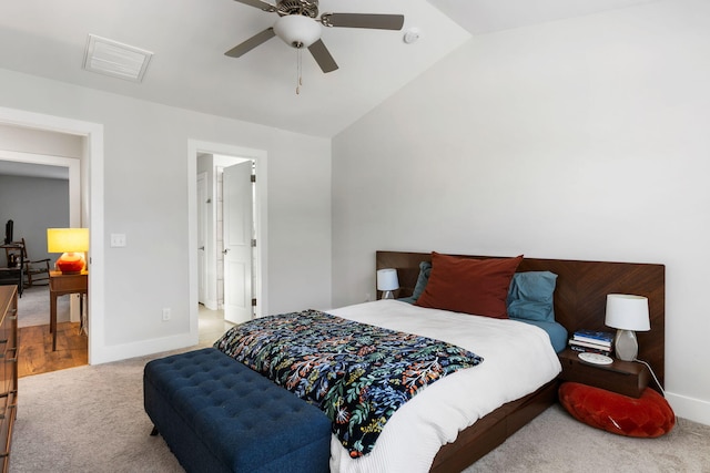 bedroom featuring baseboards, visible vents, lofted ceiling, ceiling fan, and carpet flooring