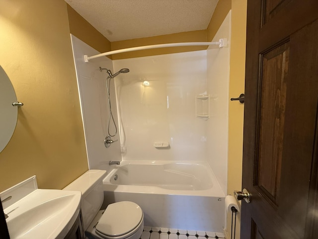 full bathroom with washtub / shower combination, a textured ceiling, toilet, and vanity