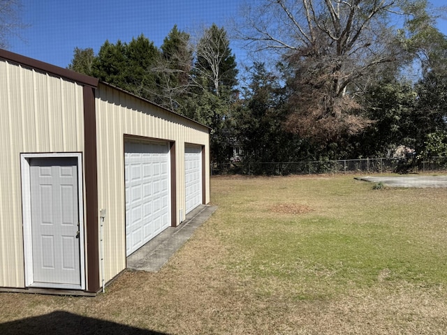 detached garage with fence