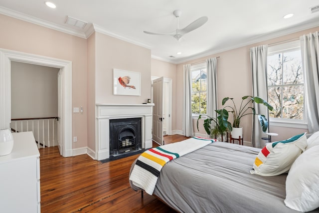 11 Franklin St, Charleston, SC 29401 - bedroom with wood finished floors, crown molding, recessed lighting, ceiling fan, and baseboards