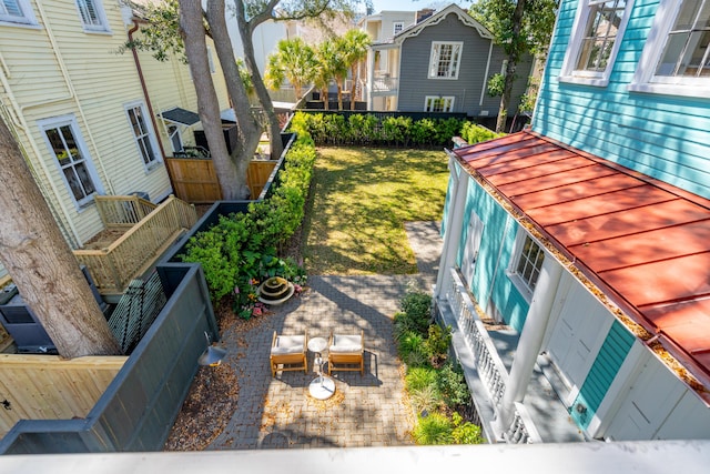 11 Franklin St, Charleston, SC 29401 - fenced backyard with a patio area