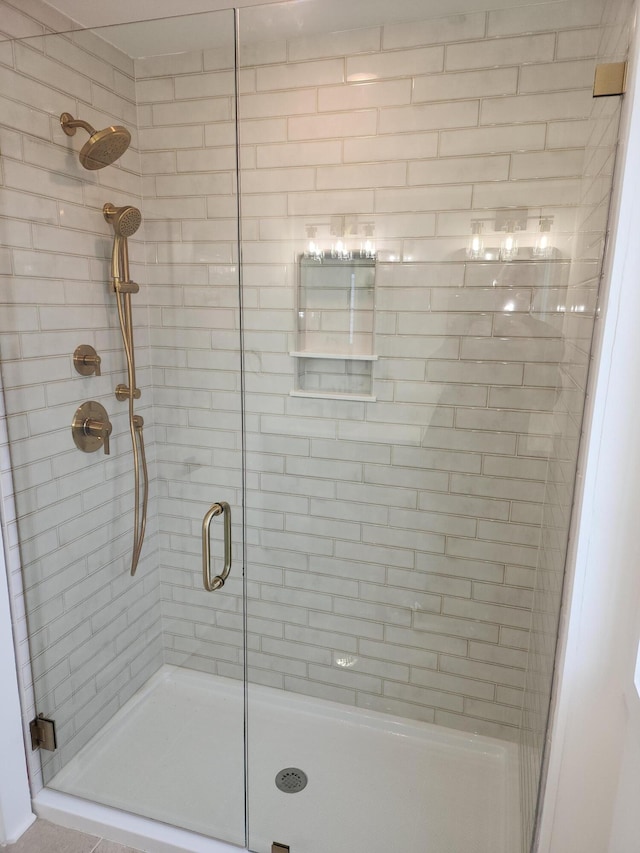 bathroom featuring walk in shower