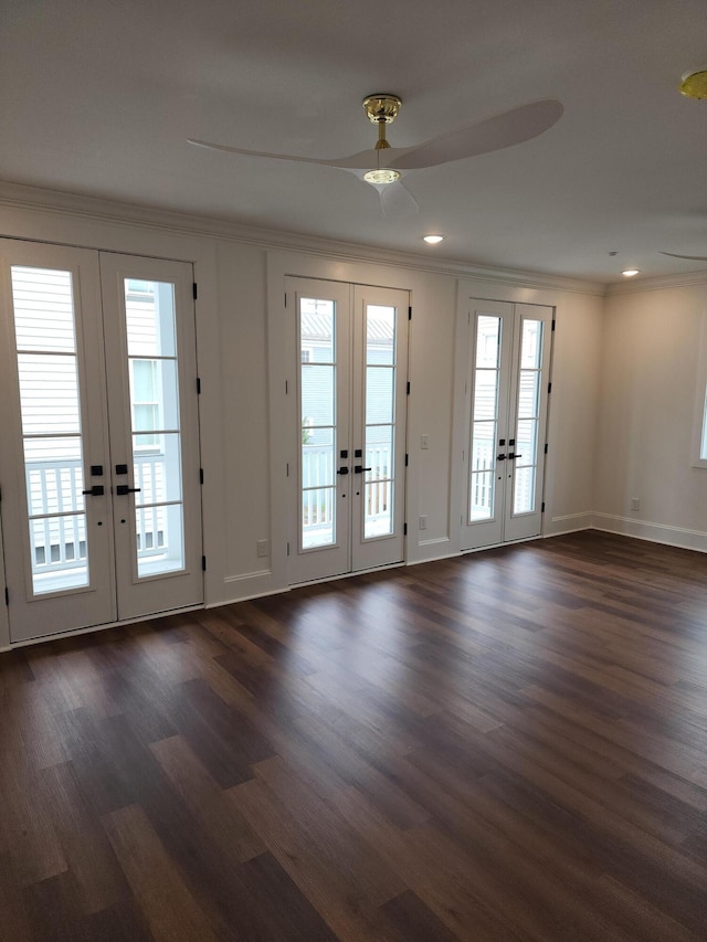 doorway to outside featuring dark hardwood / wood-style floors, ornamental molding, french doors, and ceiling fan