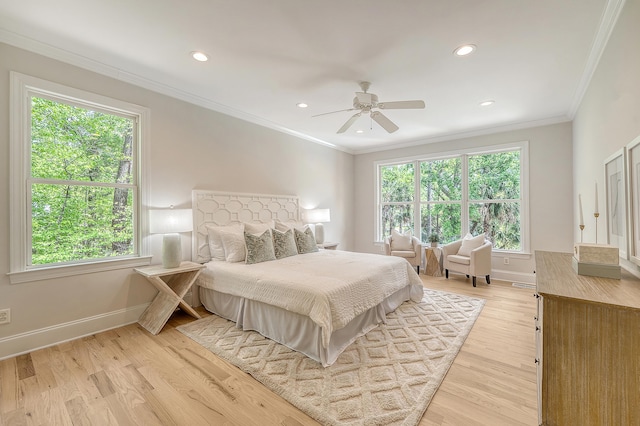 bedroom featuring recessed lighting, light wood-type flooring, multiple windows, and baseboards