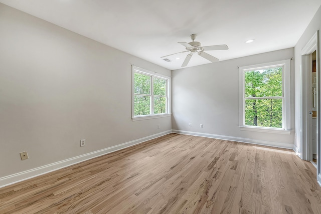 unfurnished room with visible vents, baseboards, a ceiling fan, light wood finished floors, and recessed lighting