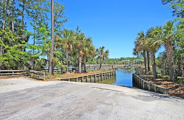 view of dock with a water view