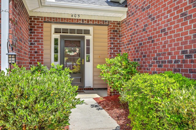 405 Decatur Dr, Summerville, SC 29486 - doorway to property with brick siding and roof with shingles