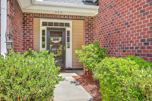 405 Decatur Dr, Summerville, SC 29486 - doorway to property with brick siding and roof with shingles